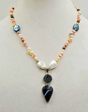 Subtle & Bold. Unique pendant necklace of pearls & agate, hand-knotted with golden silk.