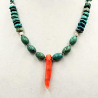 Sterling silver, turquoise, pearl, & coral focal necklace on white silk.
