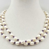 Past Work. Beautiful Baroque pearls & amethysts on hand-knotted silk, rope necklace with 14K gold clasp. 43" length. You will feel like a Royal! Sold.