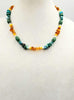 Sterling Silver, turquoise, Baltic amber, & pearl necklace on white silk. 20" Length