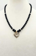 Thinking of Valentines? This elegant sterling Silver, onyx, heart pendant necklace. 21.25" could be the perfect gift. Length.