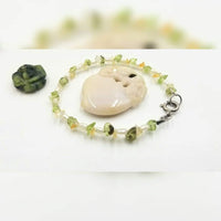 Sterling silver, pearl, citrine, & peridot bracelet. 6.75" Length.