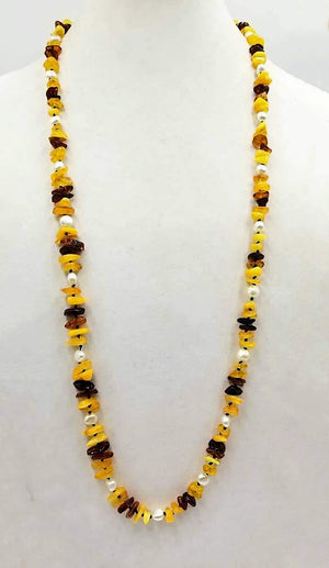 Baltic amber & pearl rope necklace on navy silk.  36" Length.