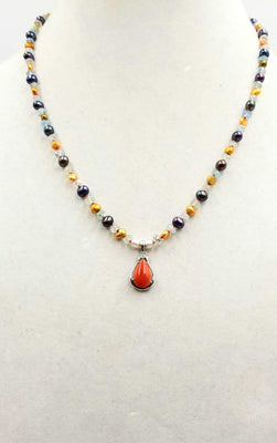 Classic! 14KWG, tri-tone pearl, aquamarine, coral, & diamond pendant necklace on crimson silk.
