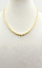 Understated Elegance. 14K yellow gold, graduated cultured pearl necklace on buttercup silk.