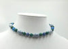 Sterling silver, azurite, marble,and malachite necklace on verde silk. 13" Length.