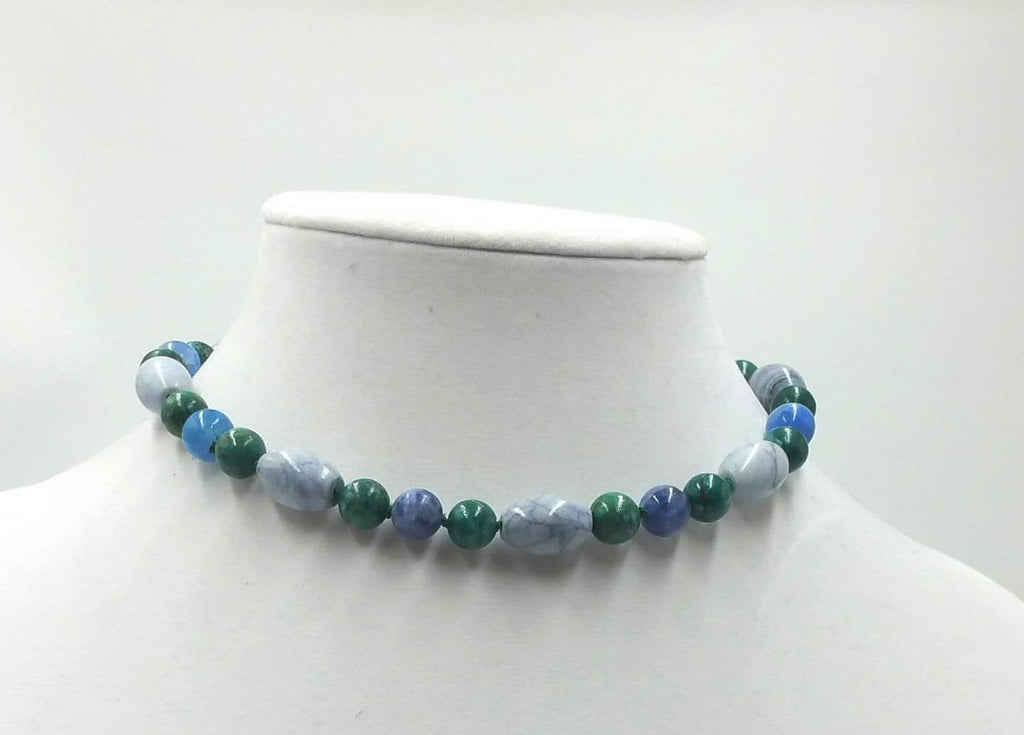Sterling silver, azurite, marble,and malachite necklace on verde silk. 13" Length.
