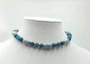 Sterling silver, azurite, marble,and malachite necklace on verde silk. 13" Length.