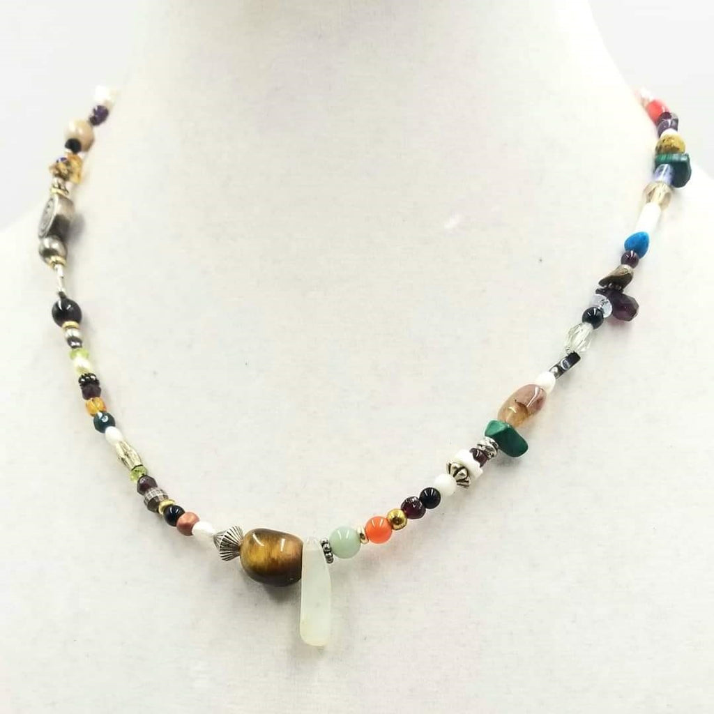Colorful and pretty cosmic necklace Adjustable, multi-color, multi-stone, cosmic necklace. 16-18.75" Length.