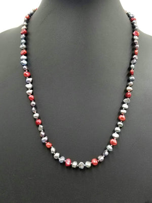 14KYG, matinee length, black & red pearl necklace on white silk. 24