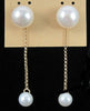 Past Work. 14KYG white pearl dangle stud earrings.