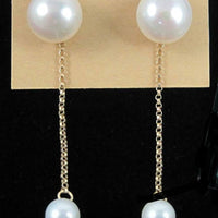 Past Work. 14KYG white pearl dangle stud earrings.