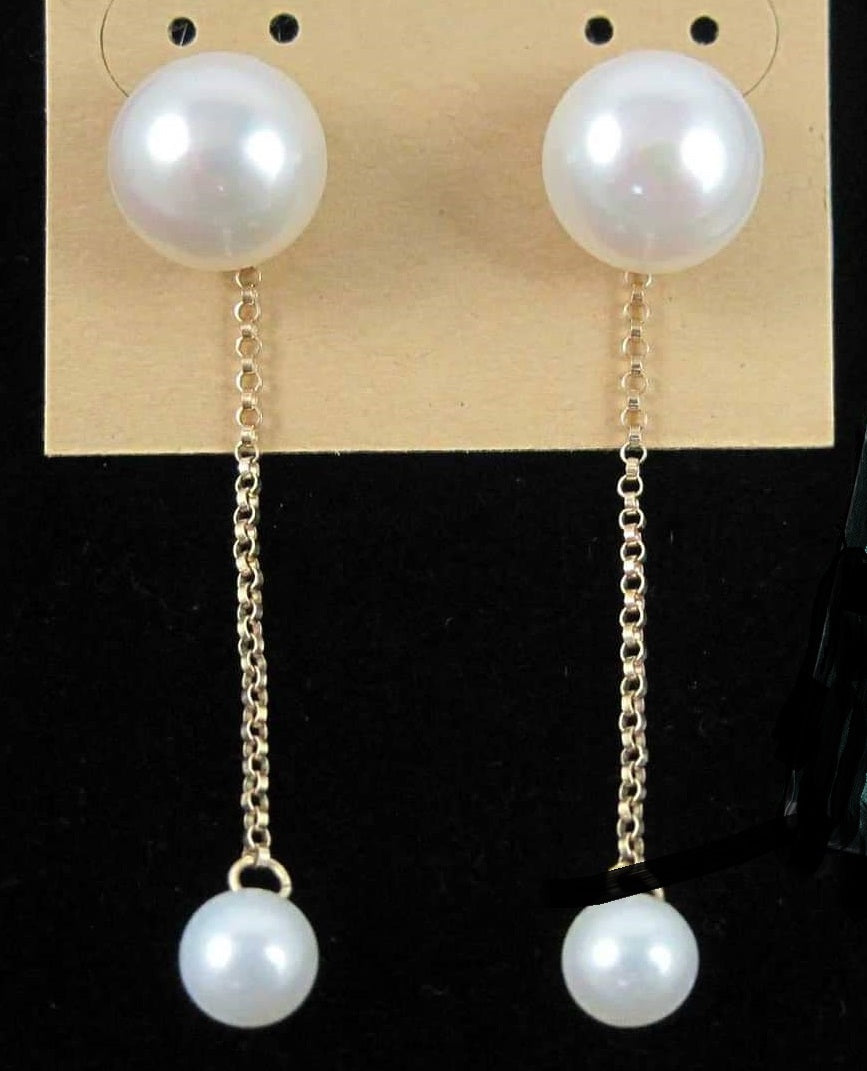 Past Work. 14KYG white pearl dangle stud earrings.