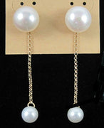 Past Work. 14KYG white pearl dangle stud earrings.