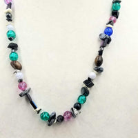 Past Work. Sterling silver, onyx, abalone, chalcedony, howlite, hematite, art glass necklace. 26" Length. Sold.