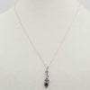 Past Work. Sterling silver, garnet & amethyst pendant on chain. 18" Length. Sold.