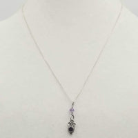Past Work. Sterling silver, garnet & amethyst pendant on chain. 18" Length. Sold.