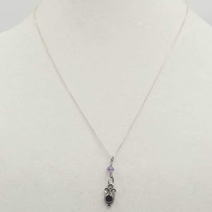 Past Work. Sterling silver, garnet & amethyst pendant on chain. 18" Length. Sold.