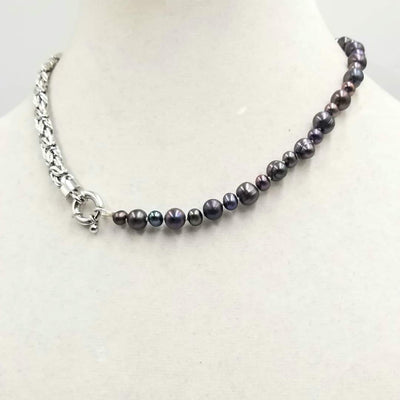 Stunning unisex necklace. Sterling silver & black pearl necklace on white silk. 17.5