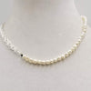 Beautiful, Unisex. Sterling silver, white pearl necklace on black silk. 17.5" Length.