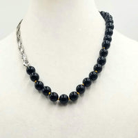 Sterling silver & Onyx necklace on golden silk. 21" lENGTH.