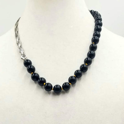 Sterling silver & Onyx necklace on golden silk. 21
