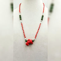 Sterling silver, nephrite, & bi-tone coral necklace on sky blue silk. 25" Length.