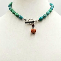 Past Work, Sterling silver, aventurine, toggle choker on silver silk with garnet and jasper pendant. 15.75" Length. Sold