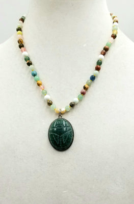 Sterling silver, multi-stone, multi-color aventurine Scarab necklace on canary yellow silk. 19.25