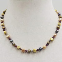 Past Work. Sterling silver, multi-color pearl and garnet necklace on purple silk. Sold.