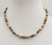 Past Work. Sterling silver, multi-color pearl and garnet necklace on purple silk. Sold.