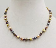 Past Work. Sterling silver, multi-color pearl and garnet necklace on purple silk. Sold.