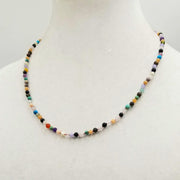 PRICE REDUCED Sterling silver, multi-stone, delicate necklace on rose silk.