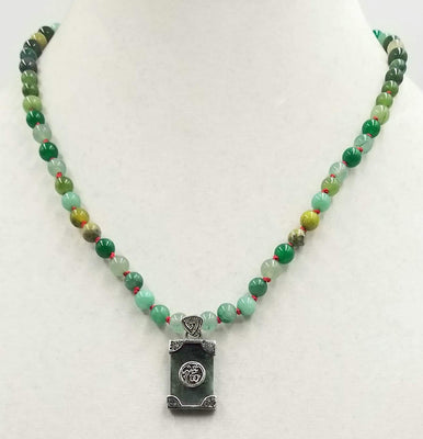 Adjustable, Sterling Silver, jadeite, agate, aventurine, chrysoprase, nephrite, malachite, and unikite necklace on crimson silk.  19