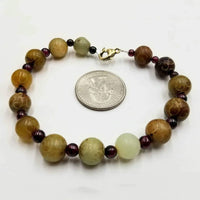 Men's carved hardstone & garnet sterling silver bracelet. 7.75'