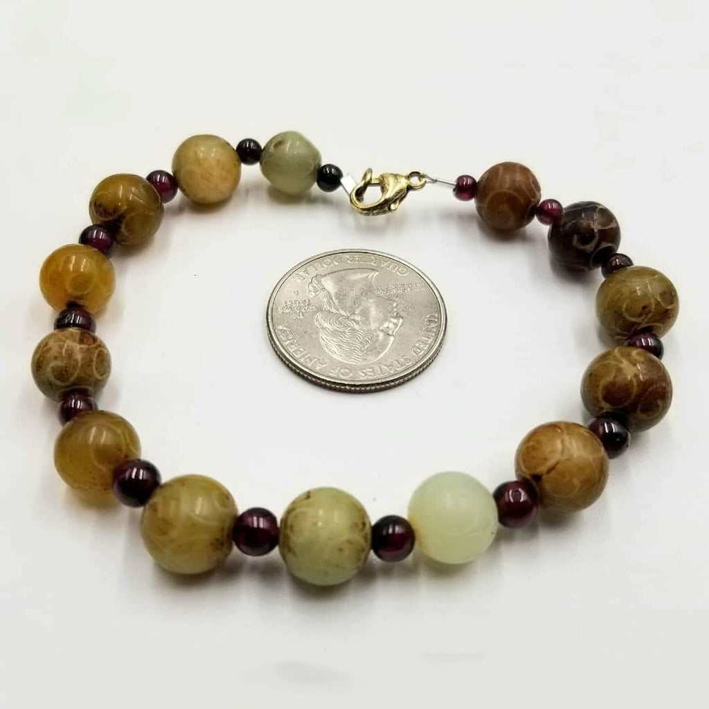 Men's carved hardstone & garnet sterling silver bracelet. 7.75'