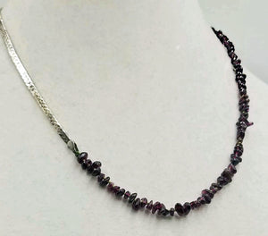 Past Work. Unisex, sterling silver & garnet streetwear fashion necklace on moss green silk. 20.5" Sold