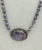 Baroque peacock pearls, sterling silver & sugilite pendant, hand-knotted necklace on lilac silk.  35" Length.