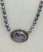 PRICE REDUCED Baroque peacock pearls, sterling silver & chariote pendant, hand-knotted necklace on lilac silk.  35" Length.