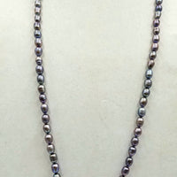 Baroque peacock pearls, sterling silver & sugilite pendant, hand-knotted necklace on lilac silk.  35" Length.