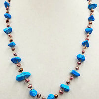Past Work. Imperial jasper & cranberry pearls, sterling silver vermeil, hand-knotted with light pink silk.  23.5" length. Sold.
