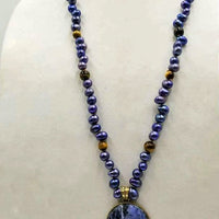 PRICE REDUCED Indigo dyed freshwater cultured pearls & tiger's eye necklace with brass sodalite pendant with hand-knotted coppertone silk.