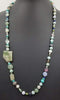 Beautiful statement piece. Turquoise colored stones & sterling silver beads are stunning.
