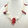 Like coral? This bold & beautiful, 14k biwa pearl & coral statement necklace, hand-knotted with canary yellow silk. 20.25" length.