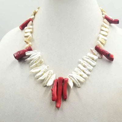 Like coral? This bold & beautiful, 14k biwa pearl & coral statement necklace, hand-knotted with canary yellow silk. 20.25