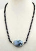 Stunningly gorgous sterling silver, Mother of Pearl & blue agate necklace on coppertone silk.  25.25"