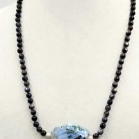 Stunningly gorgous sterling silver, Mother of Pearl & blue agate necklace on coppertone silk.  25.25"