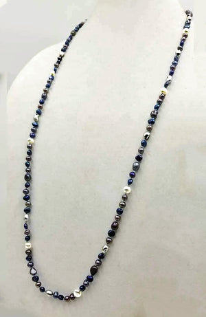 Multicolor freshwater cultured pearls on sky blue silk, rope necklace. 36" Length.