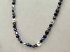 PRICE REDUCED Multicolor freshwater cultured pearls on sky blue silk, rope necklace. 36" Length.