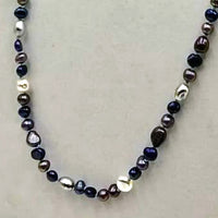 PRICE REDUCED Multicolor freshwater cultured pearls on sky blue silk, rope necklace. 36" Length.